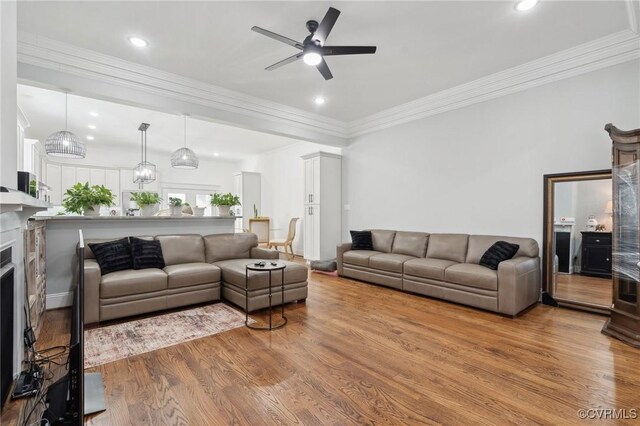 1910 Rose Ave, Richmond, VA 23222 - living area with recessed lighting, ornamental molding, ceiling fan, and wood finished floors