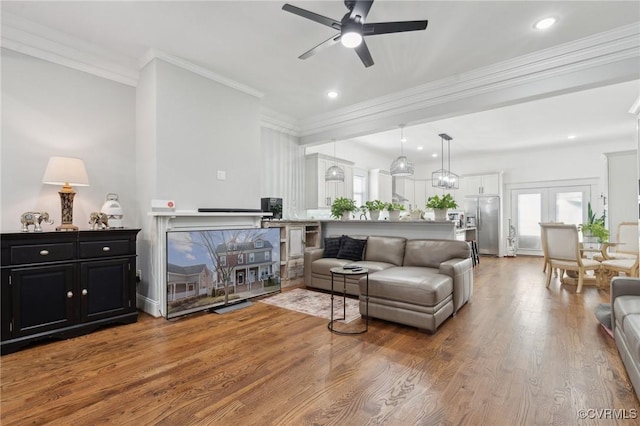 1910 Rose Ave, Richmond, VA 23222 - living area with recessed lighting, crown molding, ceiling fan, and wood finished floors