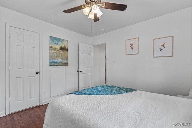 bedroom featuring ceiling fan and wood finished floors