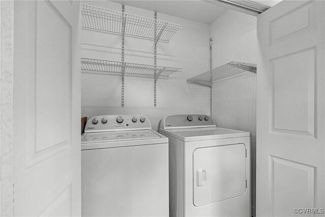 laundry room with laundry area and washer and dryer