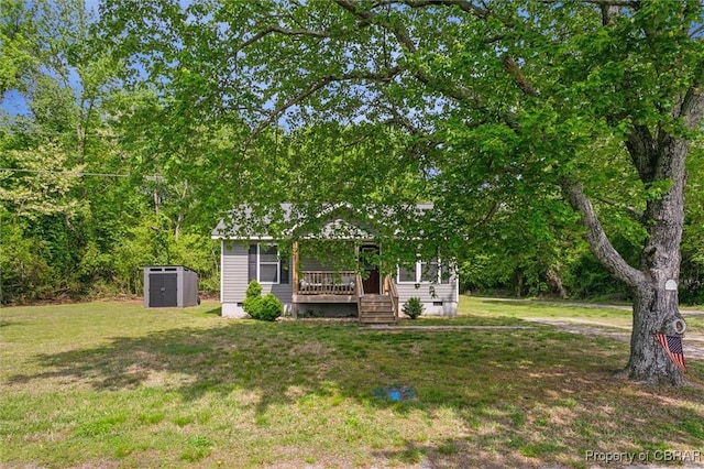view of yard featuring a storage shed, an outdoor structure, and central AC unit