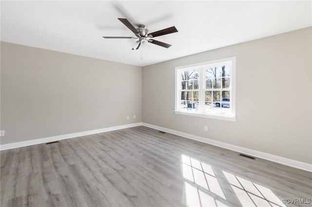 4206 Mattaponi Ave, West Point, VA 23181 - empty room with ceiling fan, wood finished floors, and baseboards