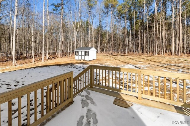 deck with an outbuilding and a shed