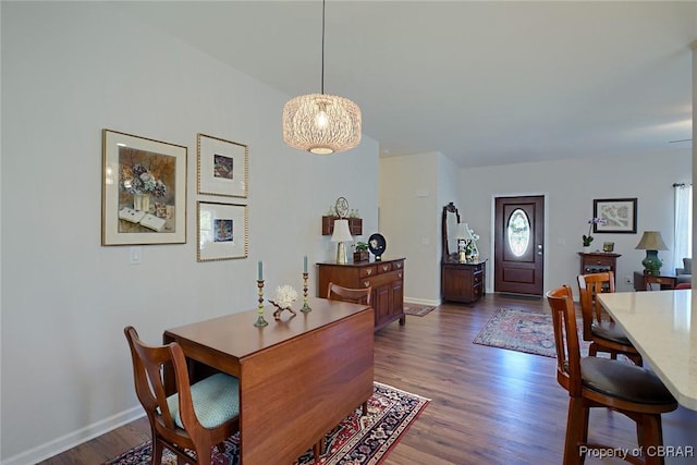 1676 Windsor Rd, Dutton, VA 23050 - dining space featuring dark wood-style floors and baseboards