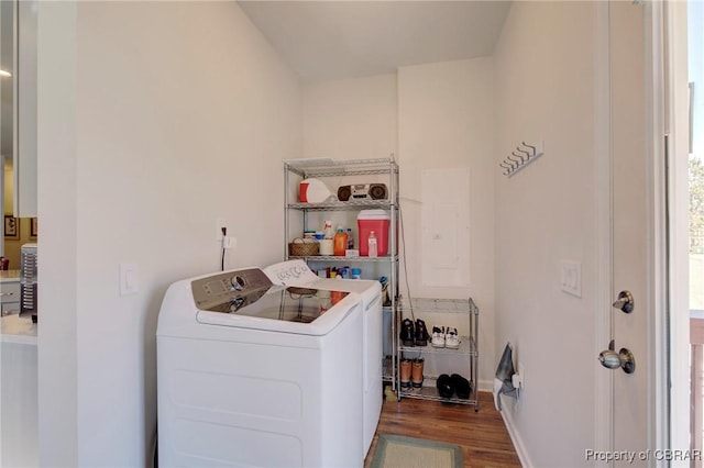 1676 Windsor Rd, Dutton, VA 23050 - washroom featuring wood finished floors and washer and clothes dryer