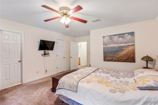 5841 Tuskwillow Dr, Richmond, VA 23832 - carpeted bedroom with a ceiling fan, baseboards, and visible vents