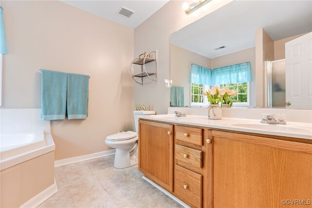5841 Tuskwillow Dr, Richmond, VA 23832 - bathroom featuring a sink, baseboards, a shower stall, and visible vents