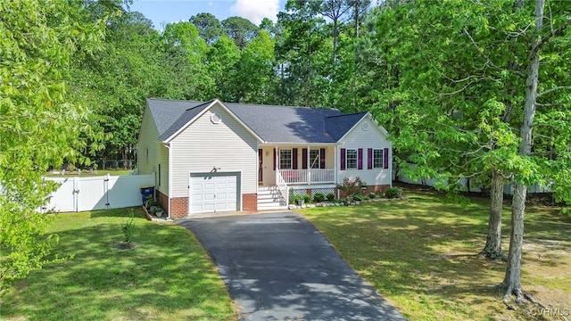 5841 Tuskwillow Dr, Richmond, VA 23832 - view of front of home featuring a porch, driveway, a gate, and a front yard