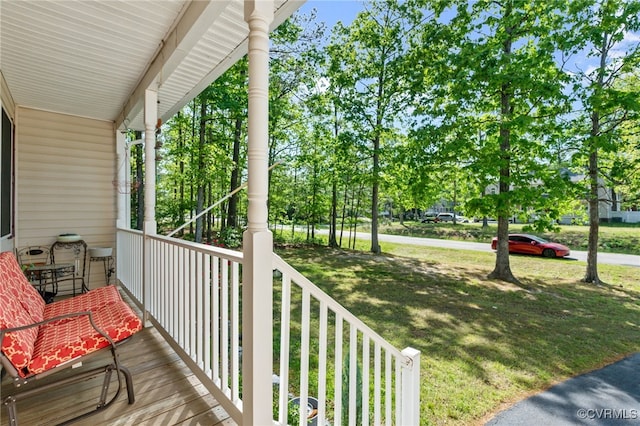 5841 Tuskwillow Dr, Richmond, VA 23832 - balcony featuring a porch