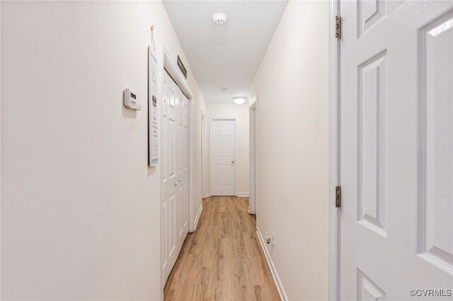 5841 Tuskwillow Dr, Richmond, VA 23832 - hallway with light wood-style floors and baseboards