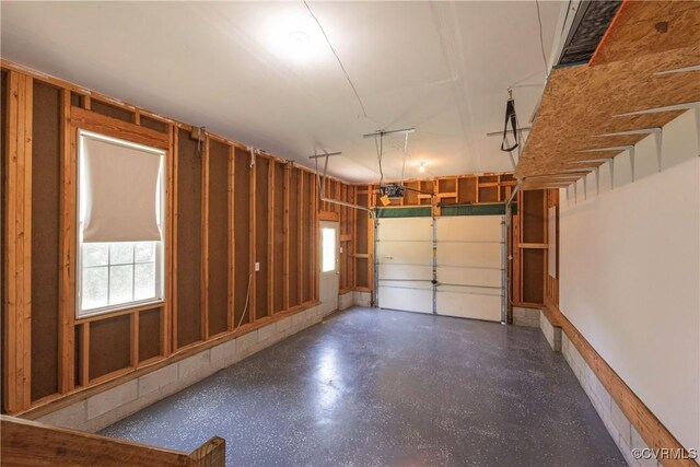 garage featuring a garage door opener