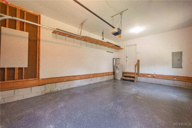 garage featuring a garage door opener, water heater, and electric panel
