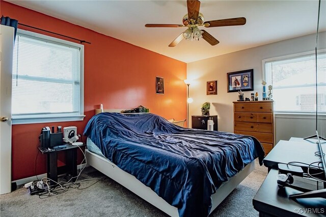 bedroom with carpet flooring and ceiling fan