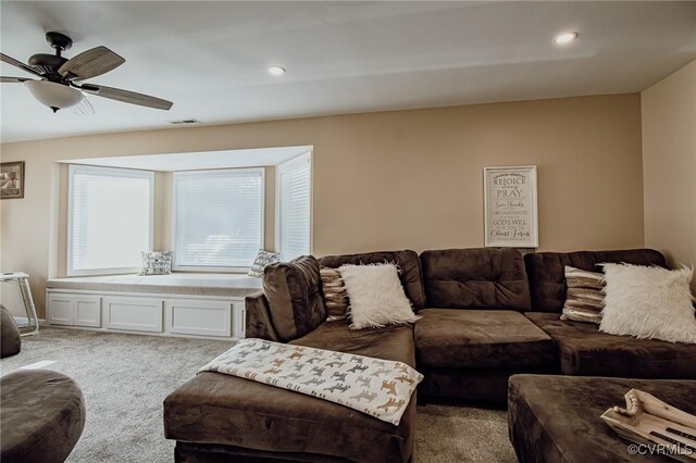 carpeted living room featuring a ceiling fan and recessed lighting