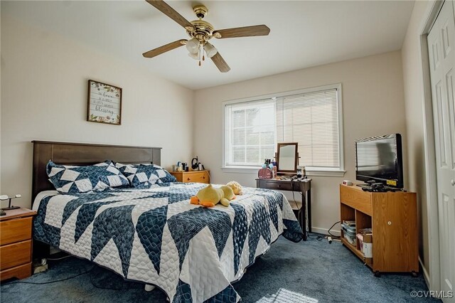 bedroom featuring baseboards, carpet flooring, and ceiling fan
