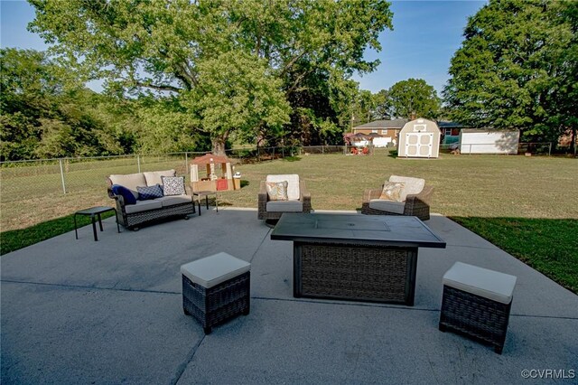 637 Cedar Level Rd, Hopewell, VA 23860 - view of patio / terrace with outdoor lounge area, a storage shed, and an outbuilding
