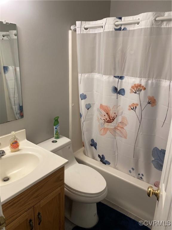 637 Cedar Level Rd, Hopewell, VA 23860 - full bathroom with shower / bathtub combination with curtain, vanity, and toilet