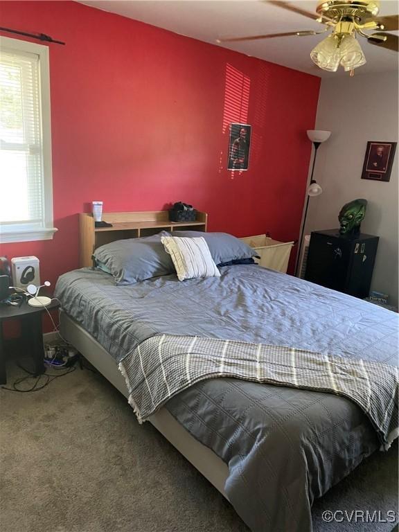 637 Cedar Level Rd, Hopewell, VA 23860 - carpeted bedroom with a ceiling fan