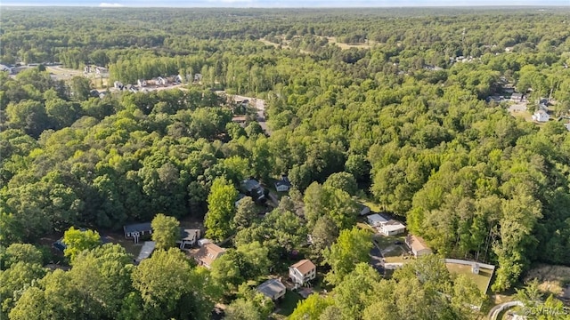 aerial view featuring a view of trees