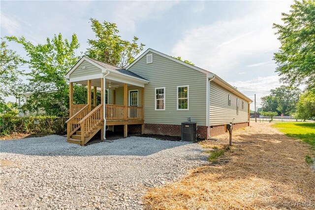 1217 Darbytown Rd, Richmond, VA 23231 - view of front facade with a porch, crawl space, cooling unit, and a ceiling fan