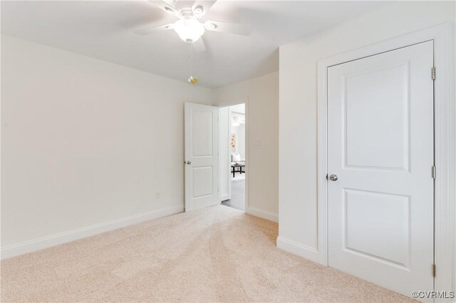 1217 Darbytown Rd, Richmond, VA 23231 - unfurnished bedroom with carpet floors, baseboards, and a ceiling fan