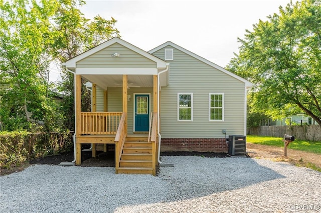 1217 Darbytown Rd, Richmond, VA 23231 - bungalow-style house with fence, covered porch, and central AC unit