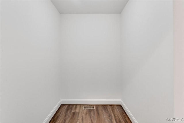 1217 Darbytown Rd, Richmond, VA 23231 - unfurnished room featuring baseboards, dark wood-style floors, and visible vents