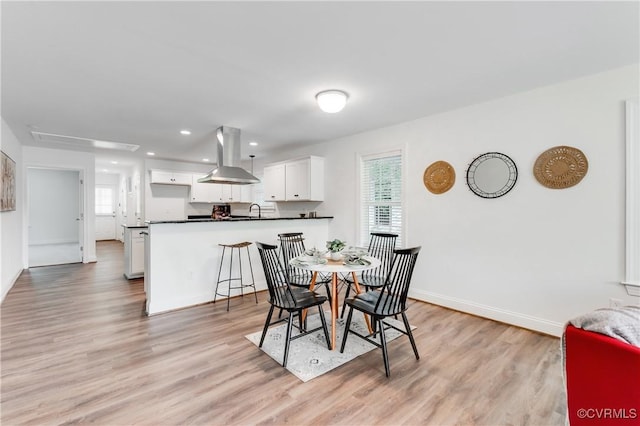 1217 Darbytown Rd, Richmond, VA 23231 - dining area with recessed lighting, baseboards, and light wood finished floors