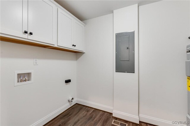 1217 Darbytown Rd, Richmond, VA 23231 - laundry room featuring washer hookup, hookup for an electric dryer, electric panel, cabinet space, and dark wood-style floors