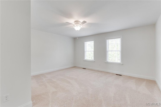 1217 Darbytown Rd, Richmond, VA 23231 - empty room featuring baseboards, carpet, a ceiling fan, and visible vents
