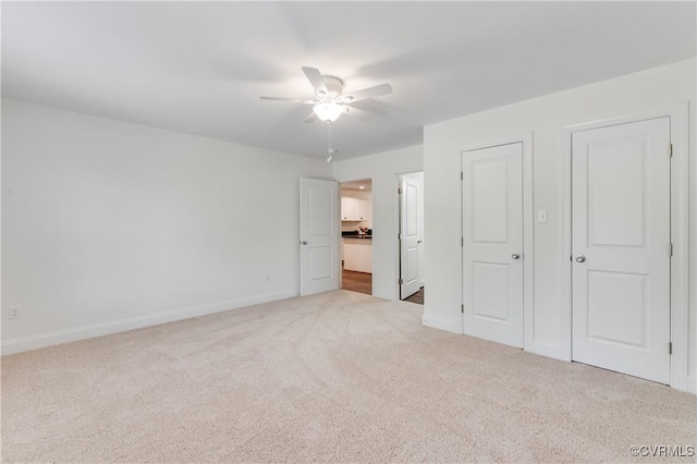 1217 Darbytown Rd, Richmond, VA 23231 - unfurnished bedroom with carpet floors, baseboards, and ceiling fan