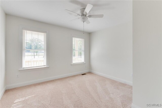 1217 Darbytown Rd, Richmond, VA 23231 - spare room featuring baseboards, carpet floors, and ceiling fan