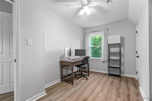 office area featuring baseboards, ceiling fan, wood finished floors, and lofted ceiling