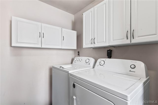 laundry area featuring cabinet space and washing machine and dryer