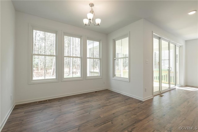 6081 Brickshire Dr, Providence Forge, VA 23140 - unfurnished dining area featuring plenty of natural light, a chandelier, and dark wood-style floors