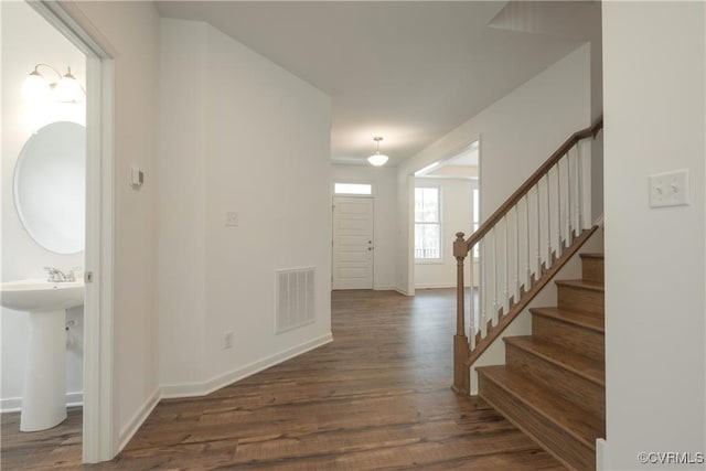 6081 Brickshire Dr, Providence Forge, VA 23140 - foyer entrance featuring baseboards, stairs, wood finished floors, and visible vents
