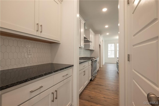 6081 Brickshire Dr, Providence Forge, VA 23140 - kitchen with recessed lighting, white cabinetry, stainless steel gas stove, and dark wood finished floors