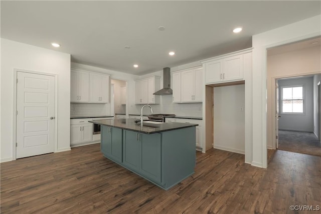6081 Brickshire Dr, Providence Forge, VA 23140 - kitchen with dark countertops, white cabinets, backsplash, and wall chimney exhaust hood