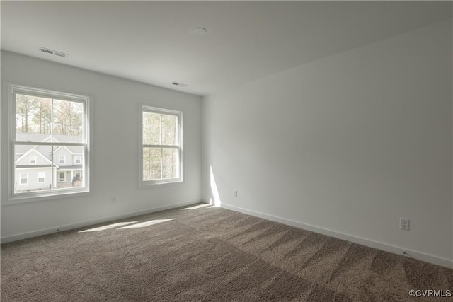 6081 Brickshire Dr, Providence Forge, VA 23140 - carpeted spare room with baseboards and visible vents