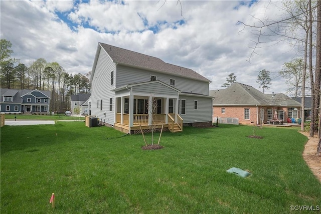 6081 Brickshire Dr, Providence Forge, VA 23140 - rear view of property with a yard, central AC, and a sunroom