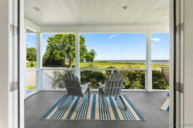 sunroom / solarium with plenty of natural light