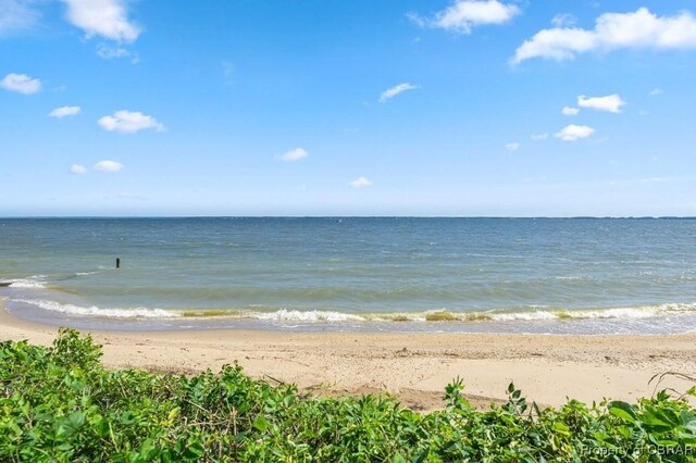 view of water feature featuring a beach view