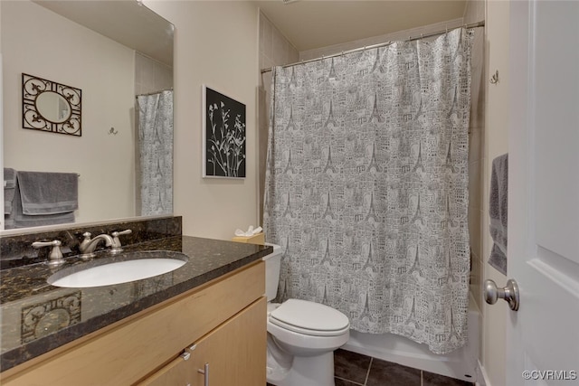 full bath with tile patterned flooring, shower / bath combination with curtain, toilet, and vanity