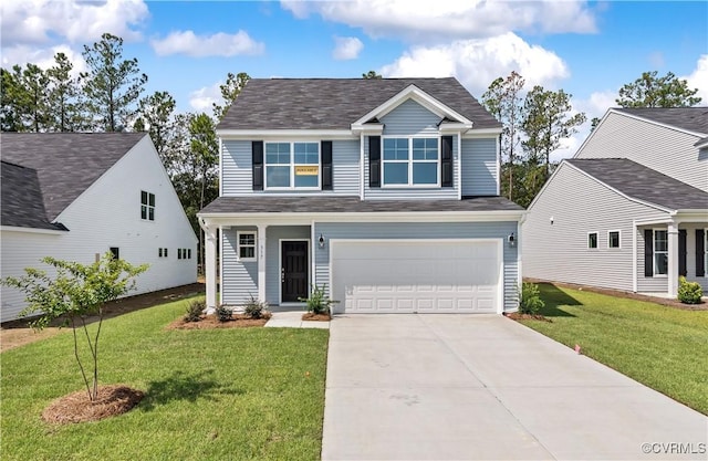 view of front of property featuring a garage, a shingled roof, driveway, and a front yard