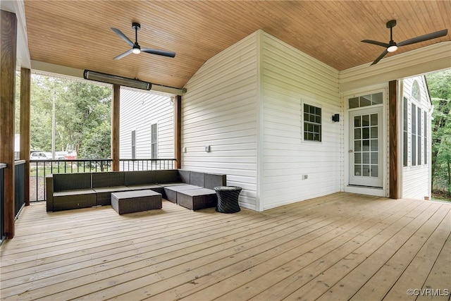 deck with ceiling fan and outdoor lounge area