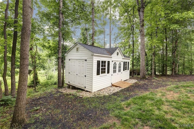 view of outbuilding featuring an outdoor structure