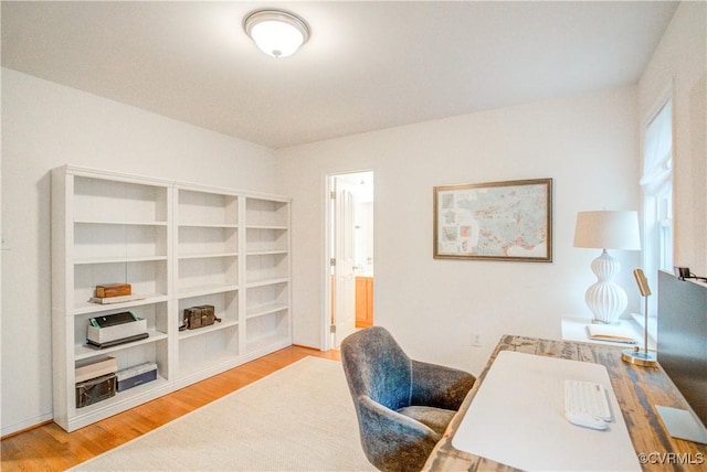 office space with wood finished floors