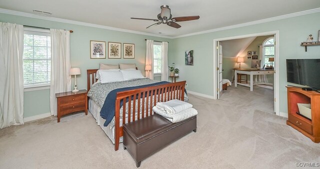 bedroom featuring baseboards, light colored carpet, ornamental molding, and multiple windows