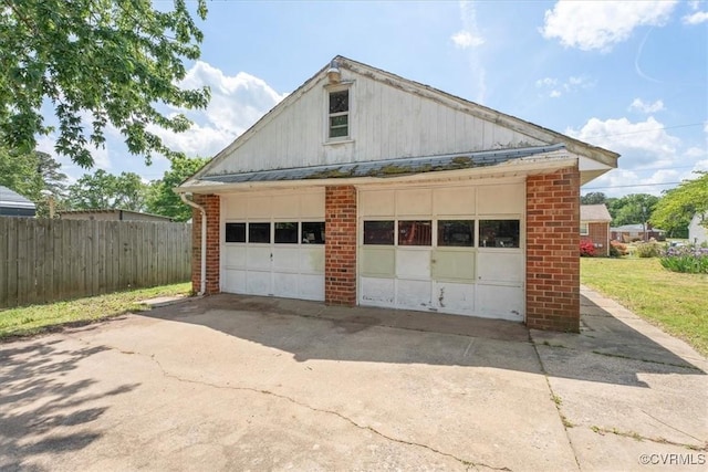 detached garage with fence