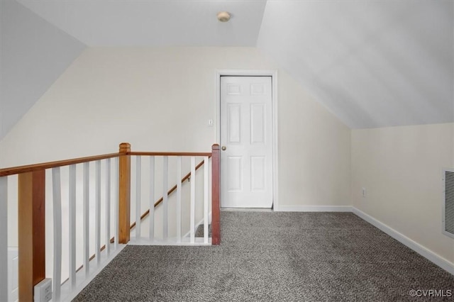 bonus room featuring carpet floors, baseboards, vaulted ceiling, and visible vents